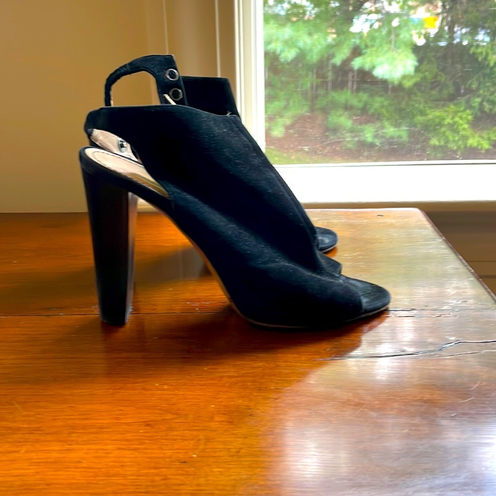 Italian suede size 7 peep toe heels.